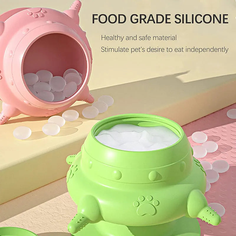 Pink silicone pet nursing device with bionic breast-shaped bowl and flat base for puppies and kittens.