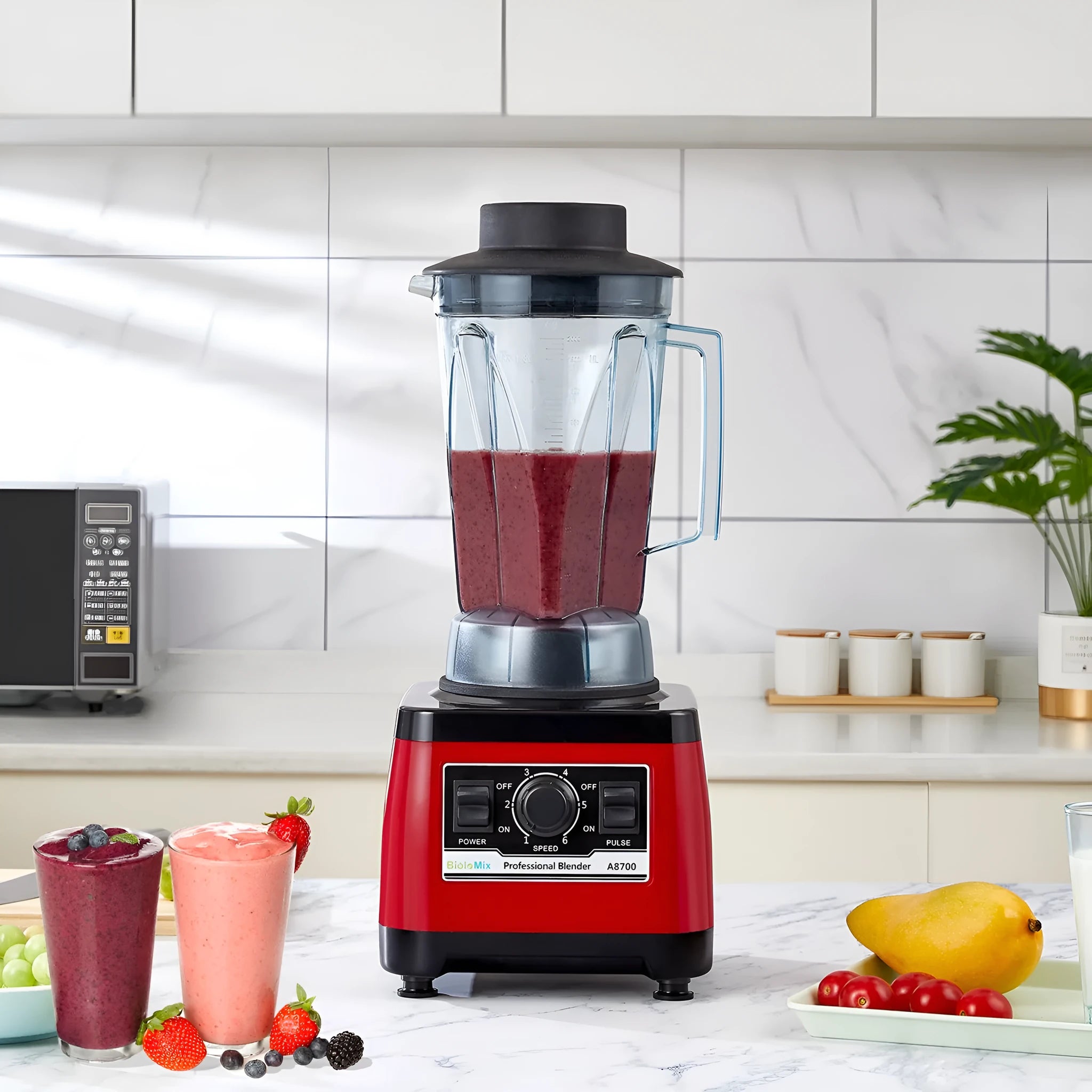 Red commercial blender model A8700 with 2L jug and 2200W motor.