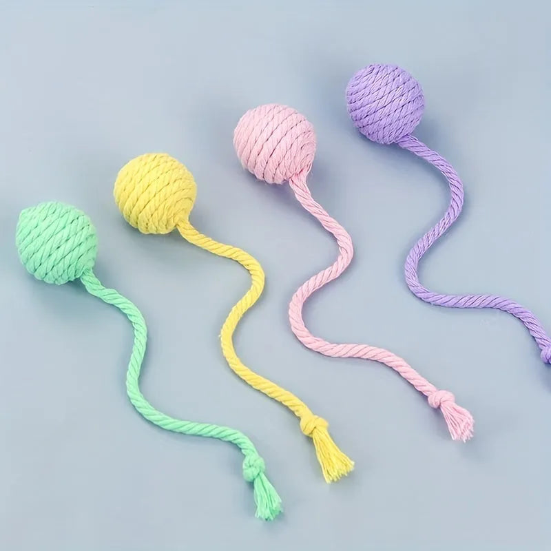 Colourful cat toy ball with attached rope, internal bell makes sound when rolled