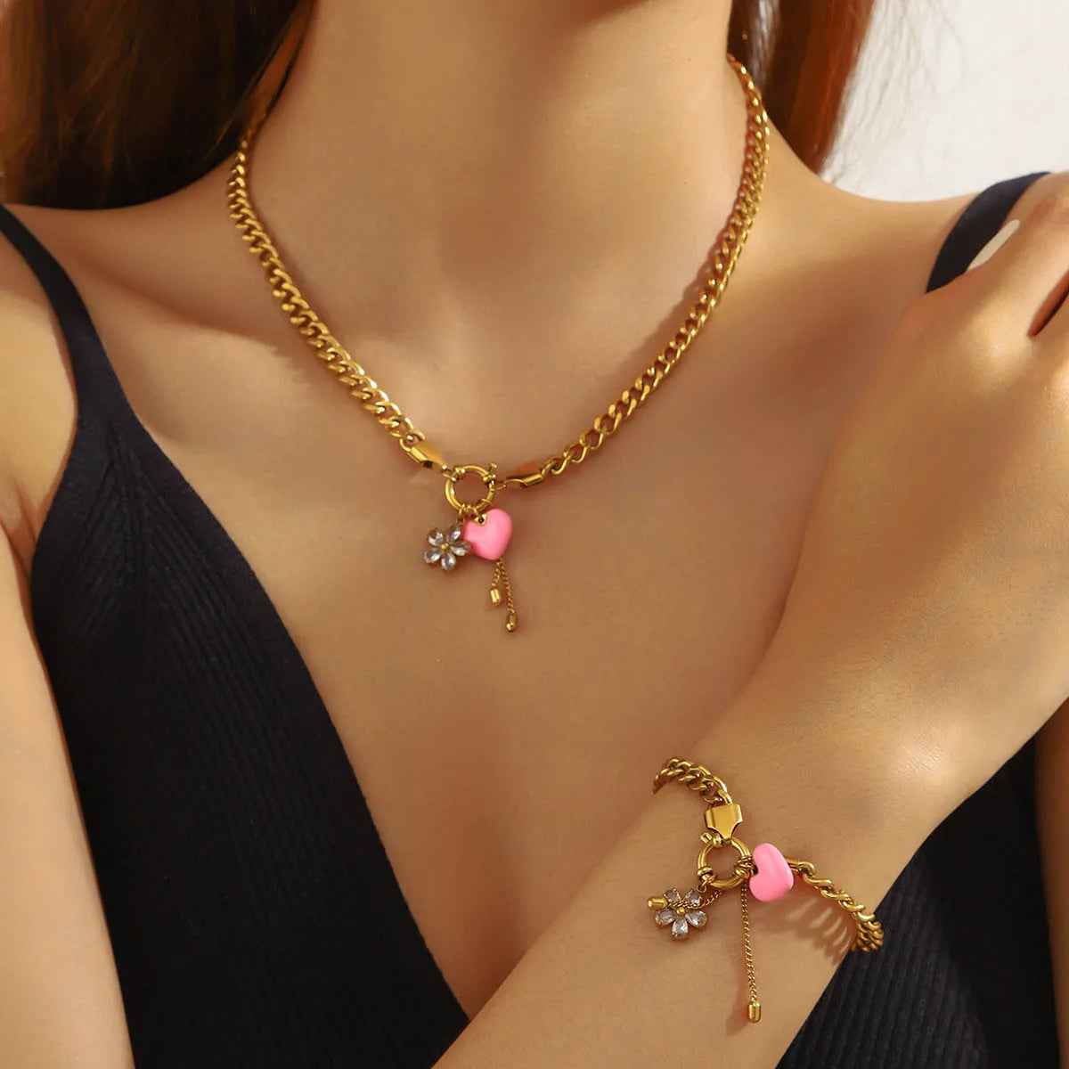 Tassel stainless steel bracelet and necklace set with flower and butterfly motifs for women