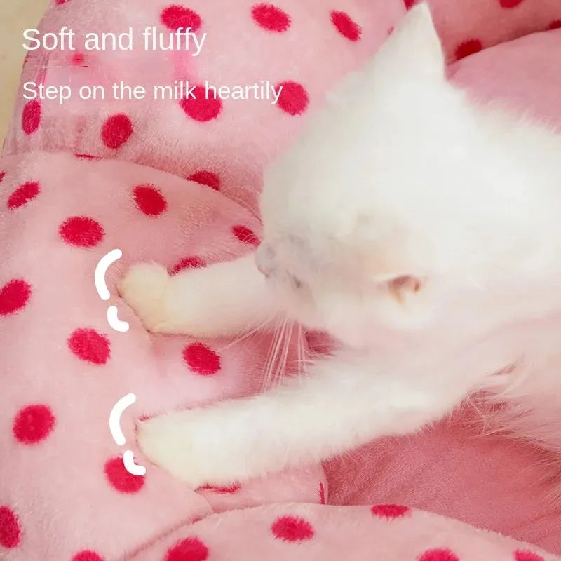 Pink dotted fabric cat bed shown in two circular sizes: 45cm and 65cm diameter.