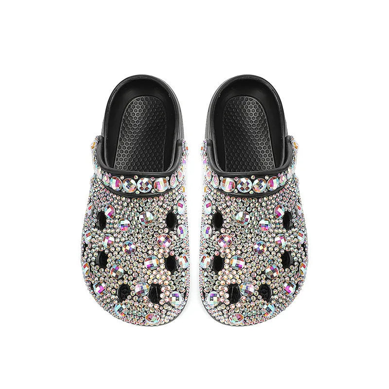 Black platform sandals for women with a rhinestone hole design and EVA construction.