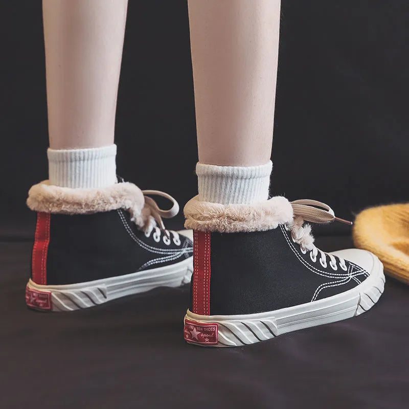 Women's black canvas high top trainers with animal print, cotton lining, buckle fastening and flat rubber sole, sizes 35-40