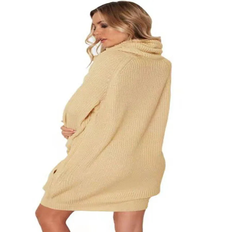 Light apricot coloured mid-length pullover sweater with a lapel collar and side pockets on a model.
