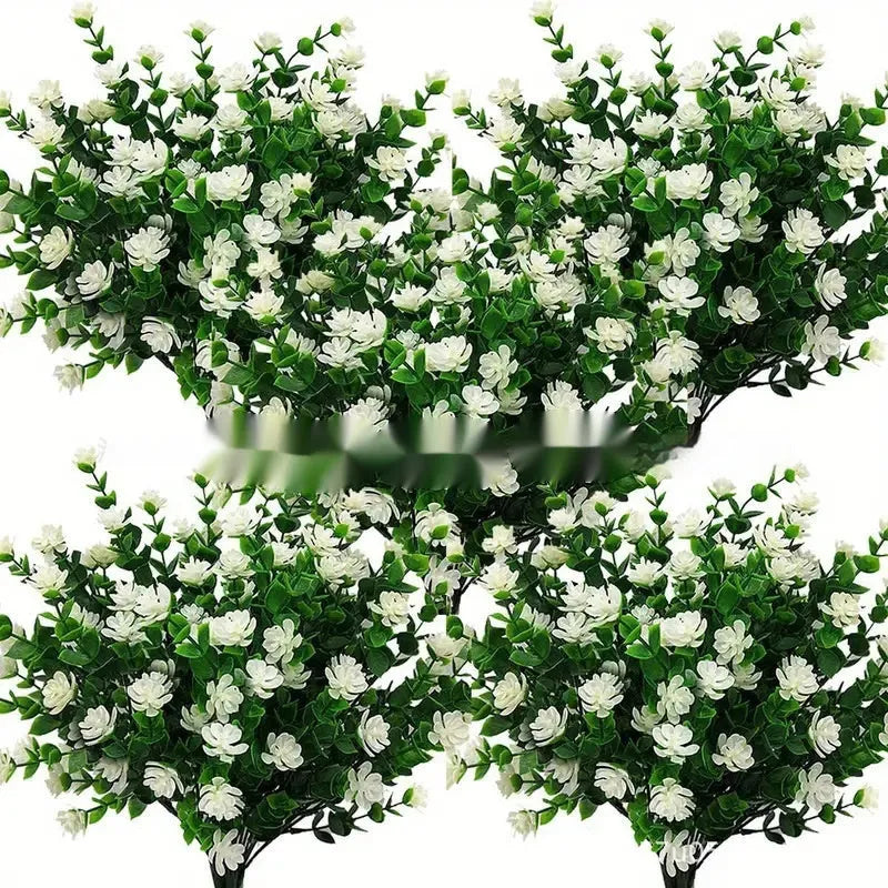 Artificial eucalyptus camellia plastic bouquet in mixed colours on white background