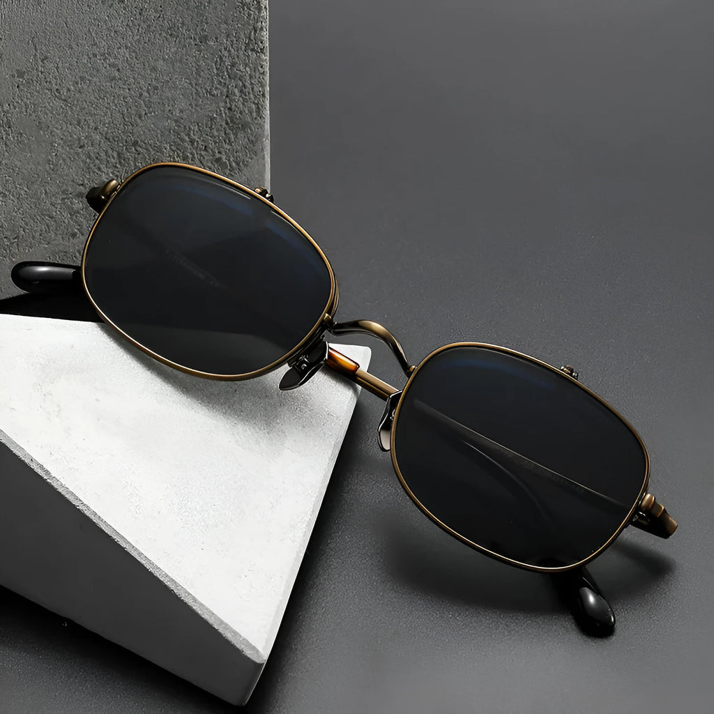 Men's flip-up polarized sunglasses with pure titanium frame in gold, silver, or bronze, black and grey AC lenses, retro box shape.