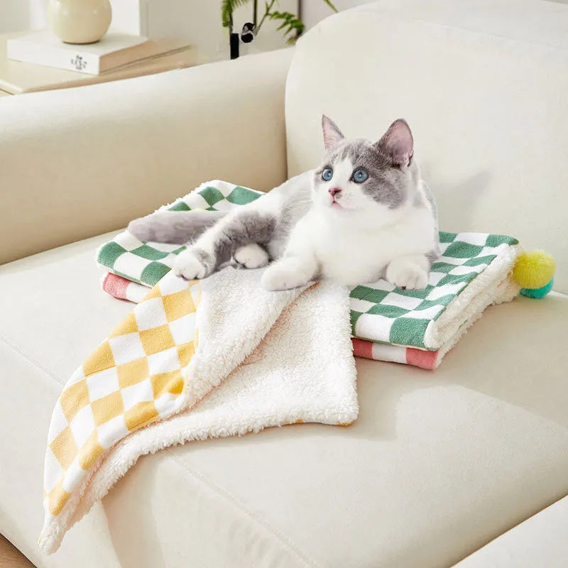 Green plaid pet blanket with soft fleece surface for cats and dogs