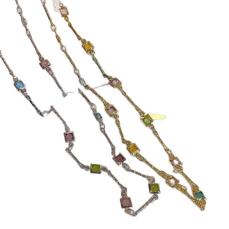 Square colour geometric clavicle chain necklace with artificial crystals in gold or white K tone finish.