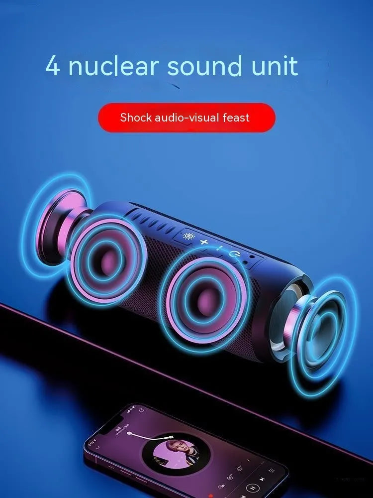 Black Bluetooth stereo mini desktop speaker with four speaker units and mesh grille