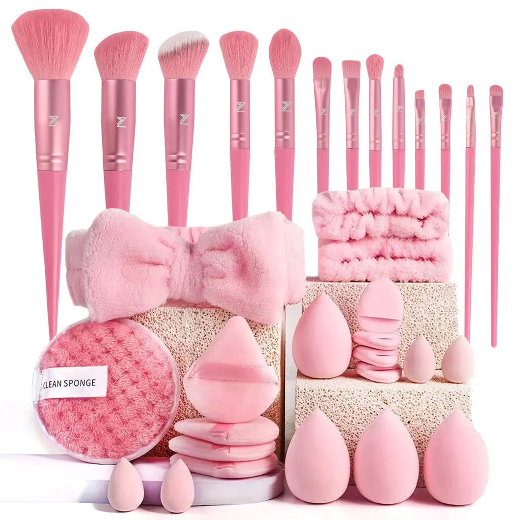 Beauty tool combination set with multiple pieces in brown, pink and purple colours for makeup and skincare