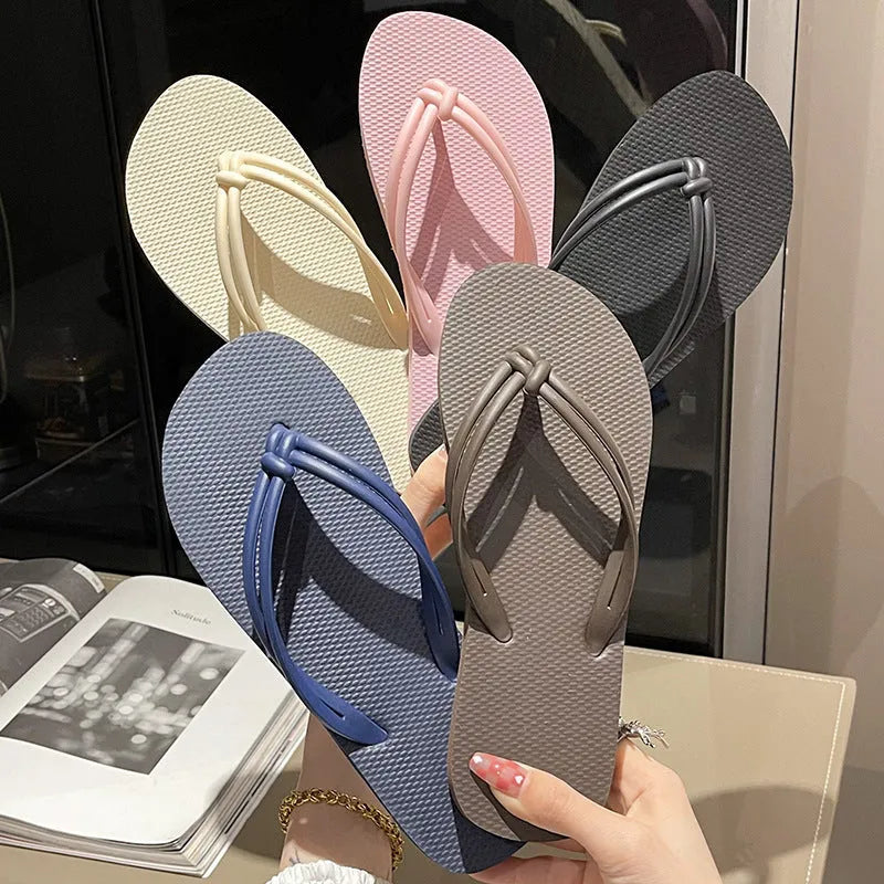 PVC toe-covering flip flops for men on a plain background showing colours and injection-moulded sole.