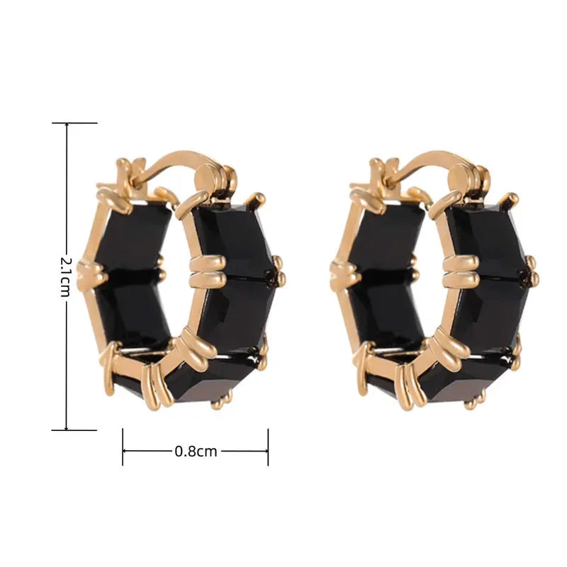 Geometric U-shaped gold ear ring with round black zircon stones