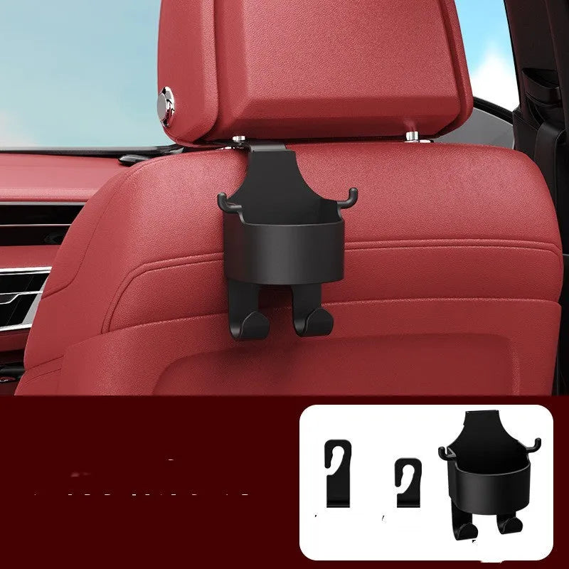 Black plastic car seat back hook with cup holder and hanging hooks for in-car organisation.