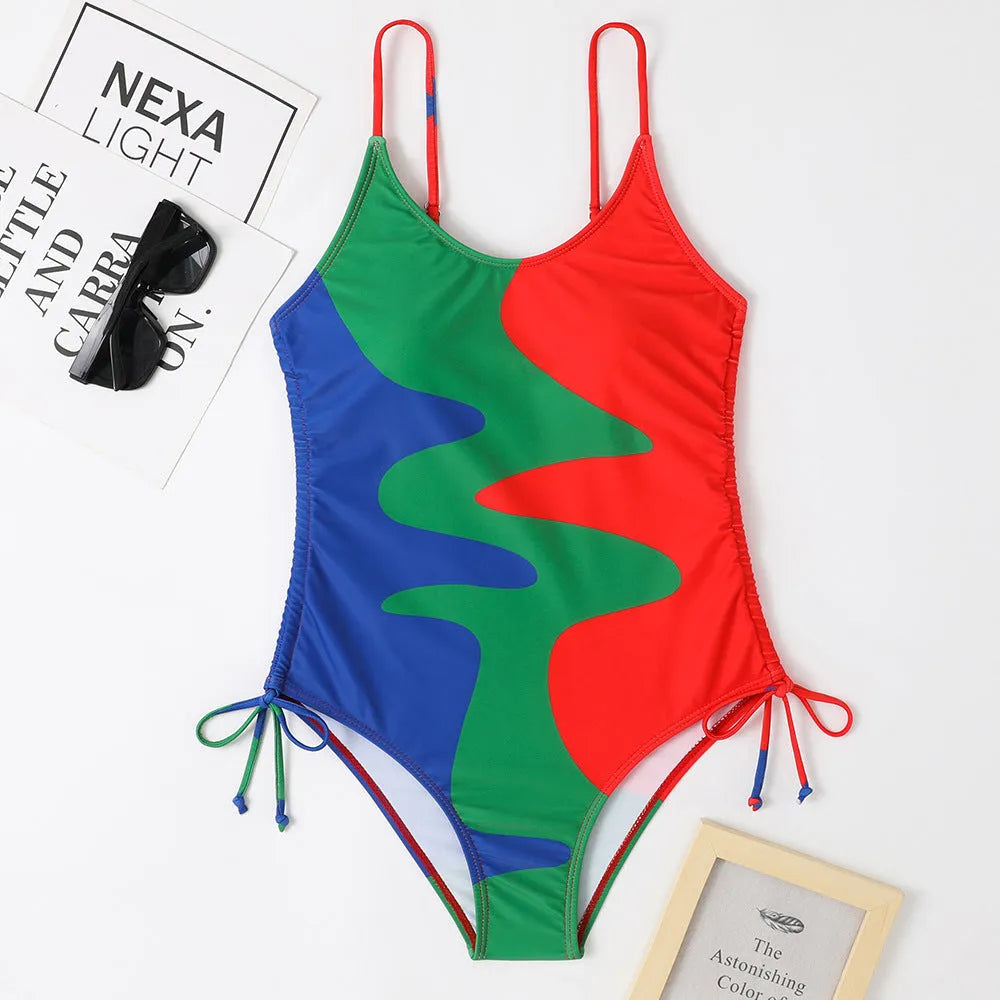 Women's blue sleeveless one-piece swimsuit with fixed swimming trunks on a white background.