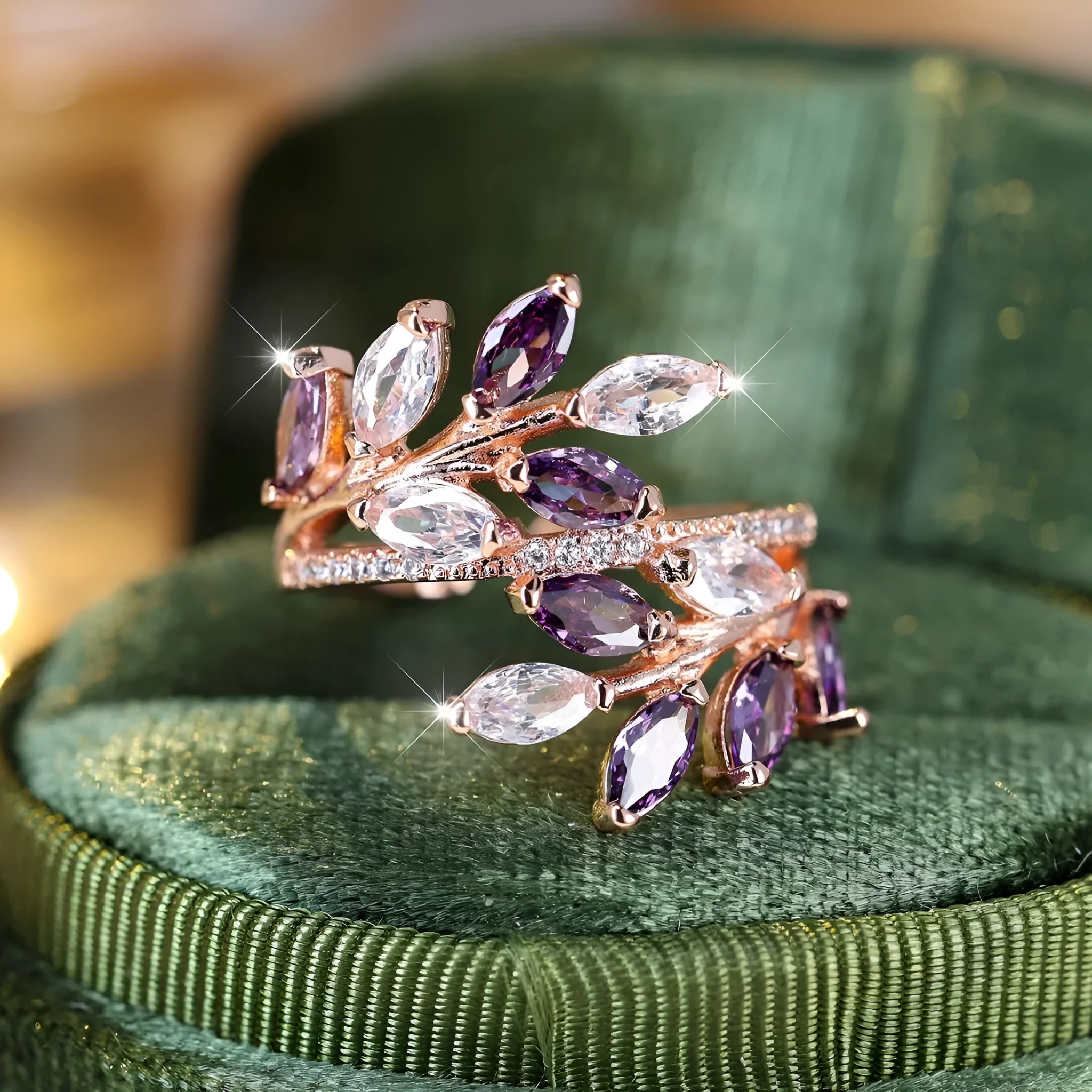 Adjustable leaf ring with horse eye zircon stone in rose gold finish on wooden background