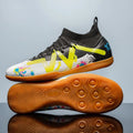 Low-top adult football trainers in black and yellow with anti-slip rubber outsole