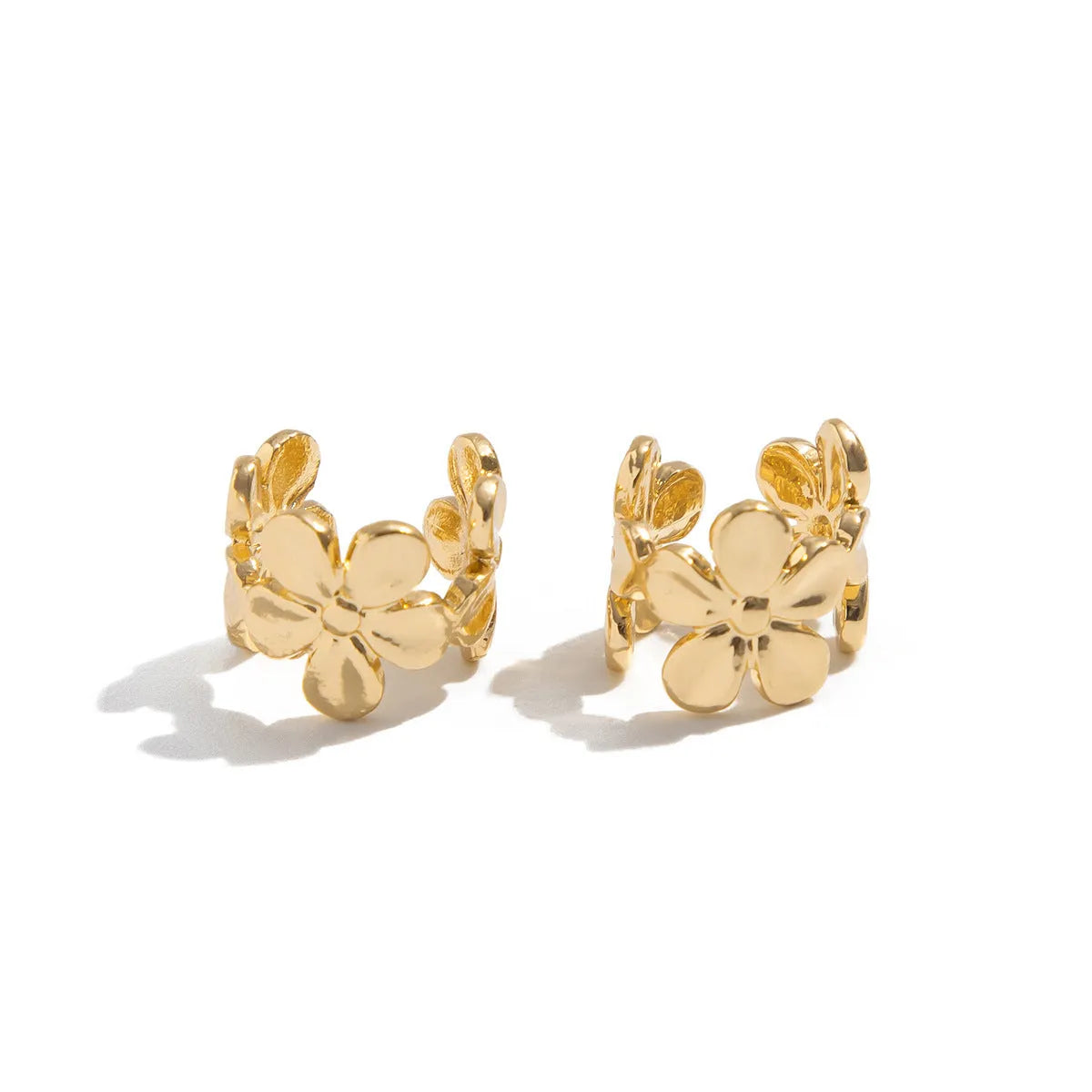 Women's starfish and conch shell stud earrings with electroplated gold finish