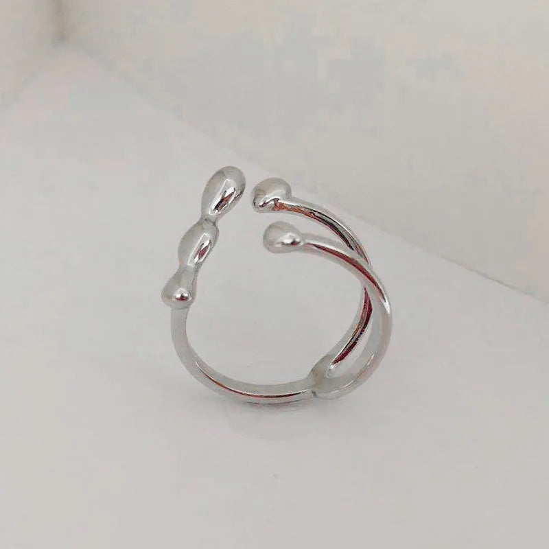 Brass spherical fashion ring in gold or silver colour for women