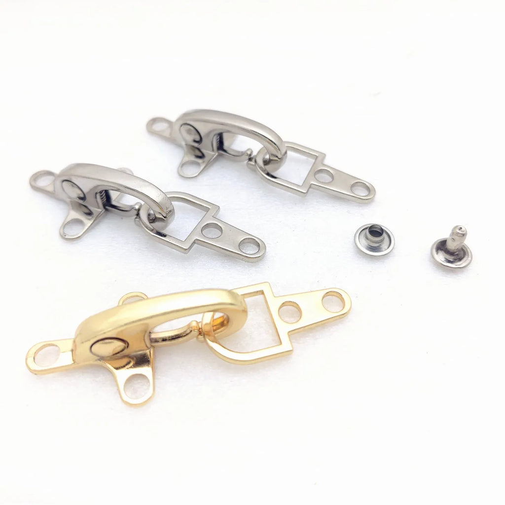 Zinc alloy aircraft-shaped hanging buckle decoration in metallic finish, shown at 5.85 cm size.