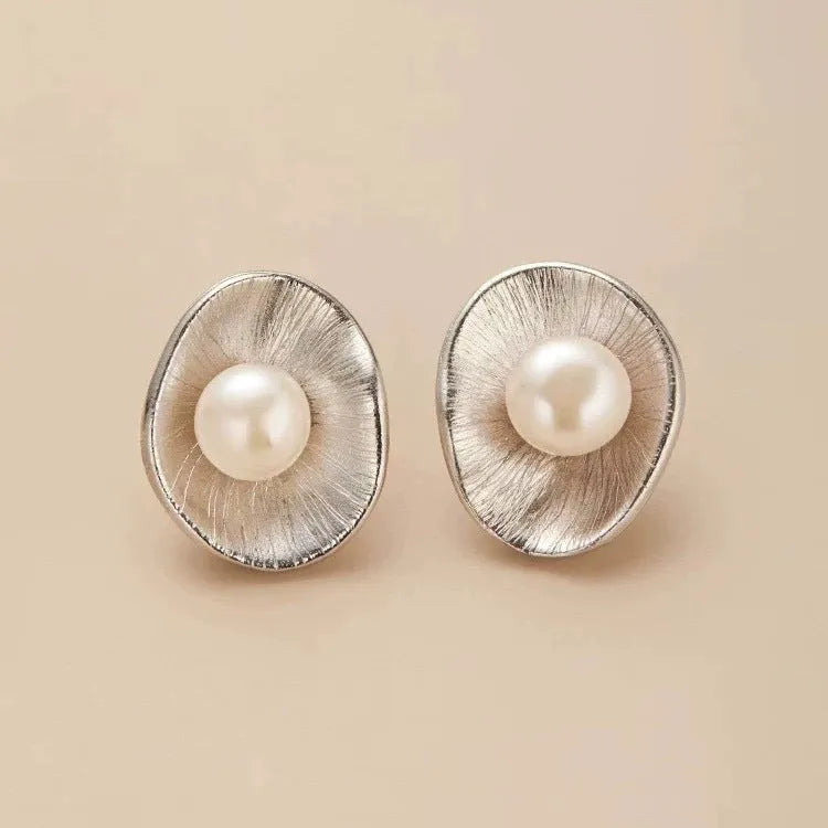 Pearl sterling silver needle earrings with electroplated gold finish and geometry shape design