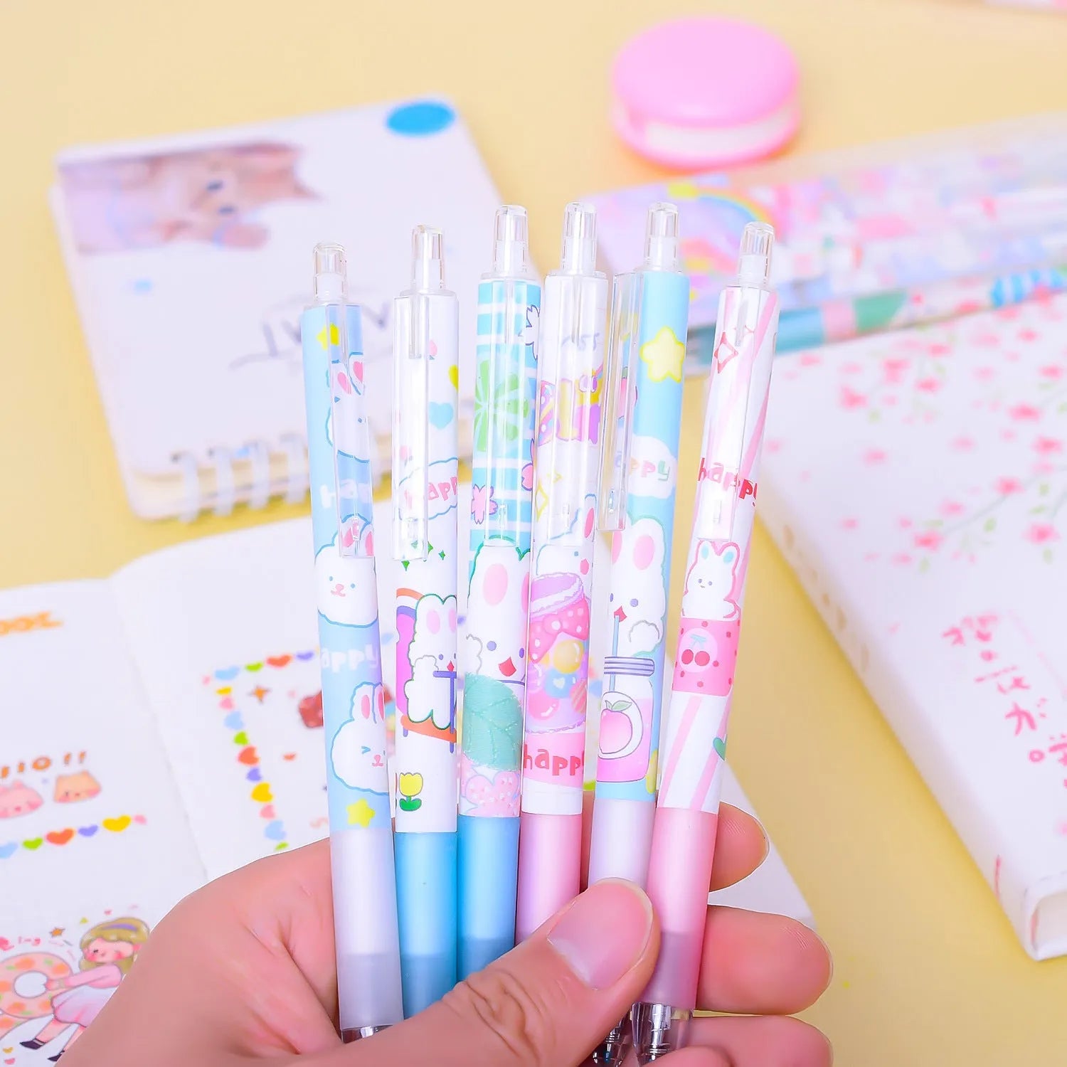 Six cartoon bunny student stationery pens with 0.5mm black signature tips in neutral colours