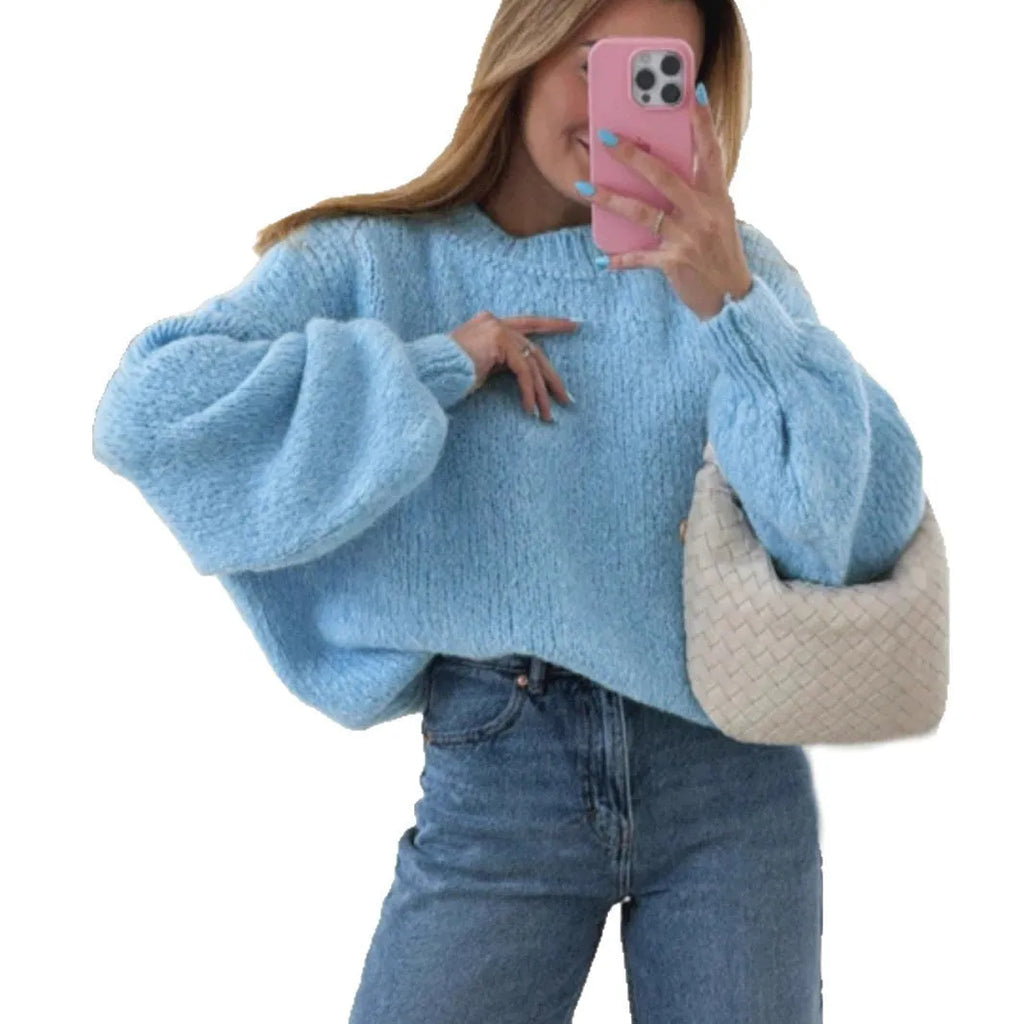 Blue round neck pullover sweater with long sleeves and loose fit, available in sizes S to XL.