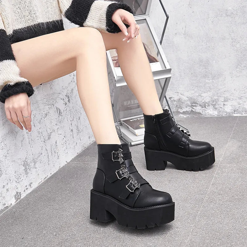 Black women's punk-style short Martin boots featuring a bat buckle, side zipper, and thick heel