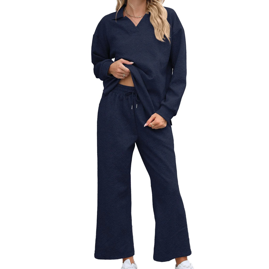 Geometric patterned women's knitted suit with long sleeve top and cropped elastic waist trousers
