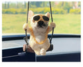 Cartoon-style resin bulldog car pendant hanging from a rearview mirror.