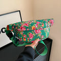 Women's western style waist bag with big flower design and contrast stitching in nylon material