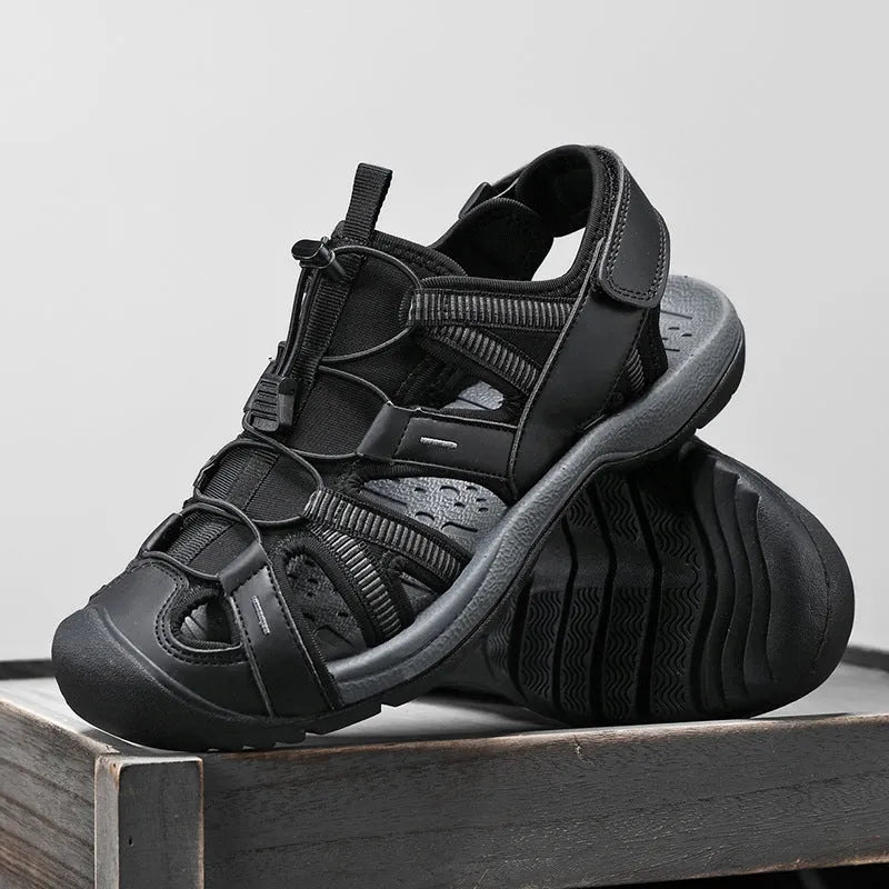 Men's blue outdoor sports shoes with velcro straps and a mesh upper on a rubber sole.
