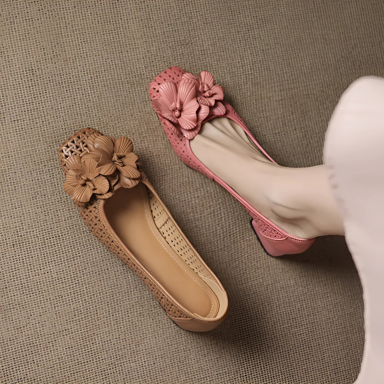 Light brown women's leather pumps with hollow weave design and a mid heel on a beef tendon sole.