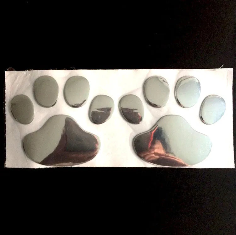 PVC hand-shaped car sticker with dog footprints in red, silver, gold, and black colour options.