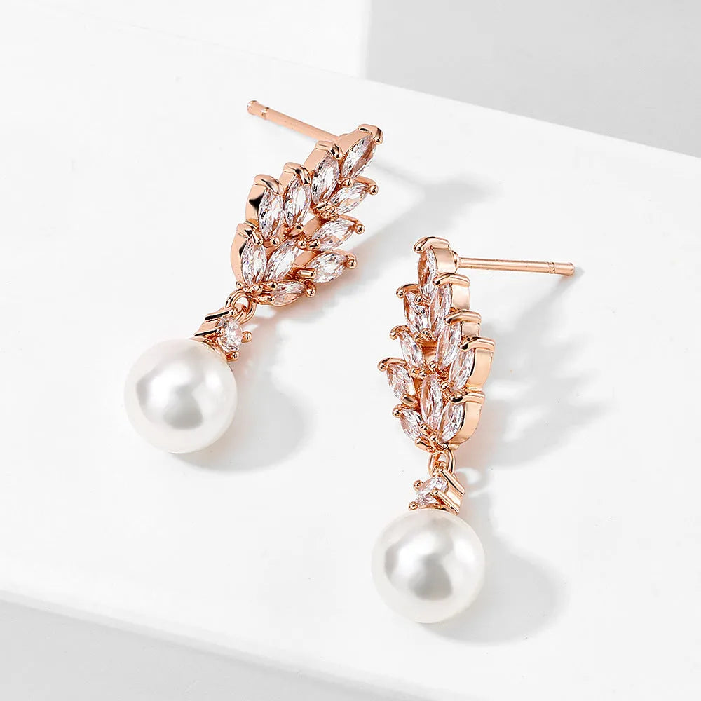 Geometric women's earrings with micro inlaid zircon stones and pearl accents in three metal colours