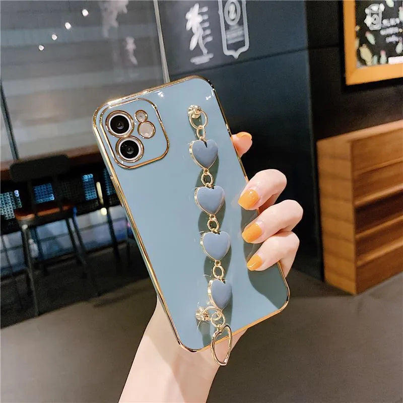 Green silicone phone case with attached bracelet for Samsung and iPhone Xr.