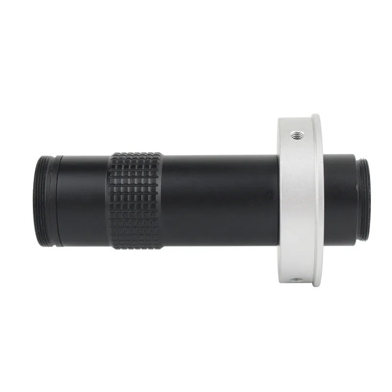 Black anodised aluminium industrial camera monocular lens for high-magnification inspection.