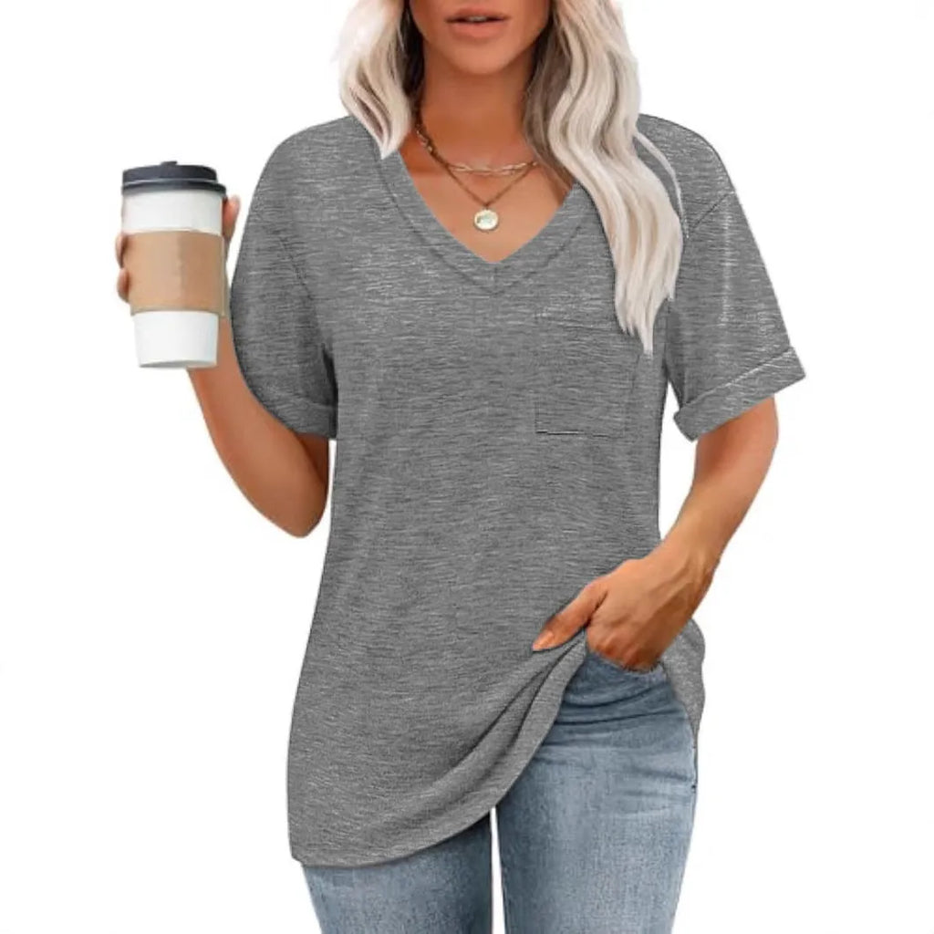 Grey loose V-neck t-shirt with pocket and short sleeves laid flat