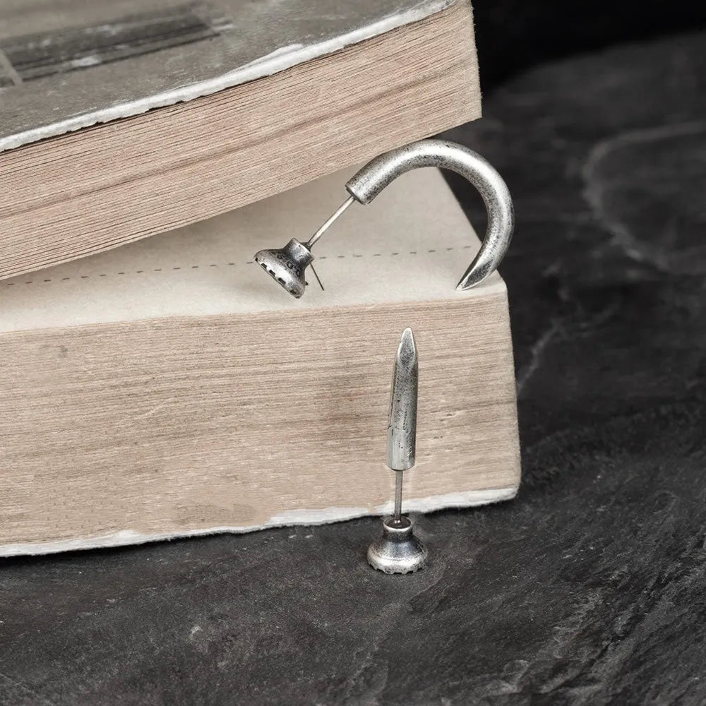 S925 sterling silver nail stud earring on ear hook, straight and curved style shown.