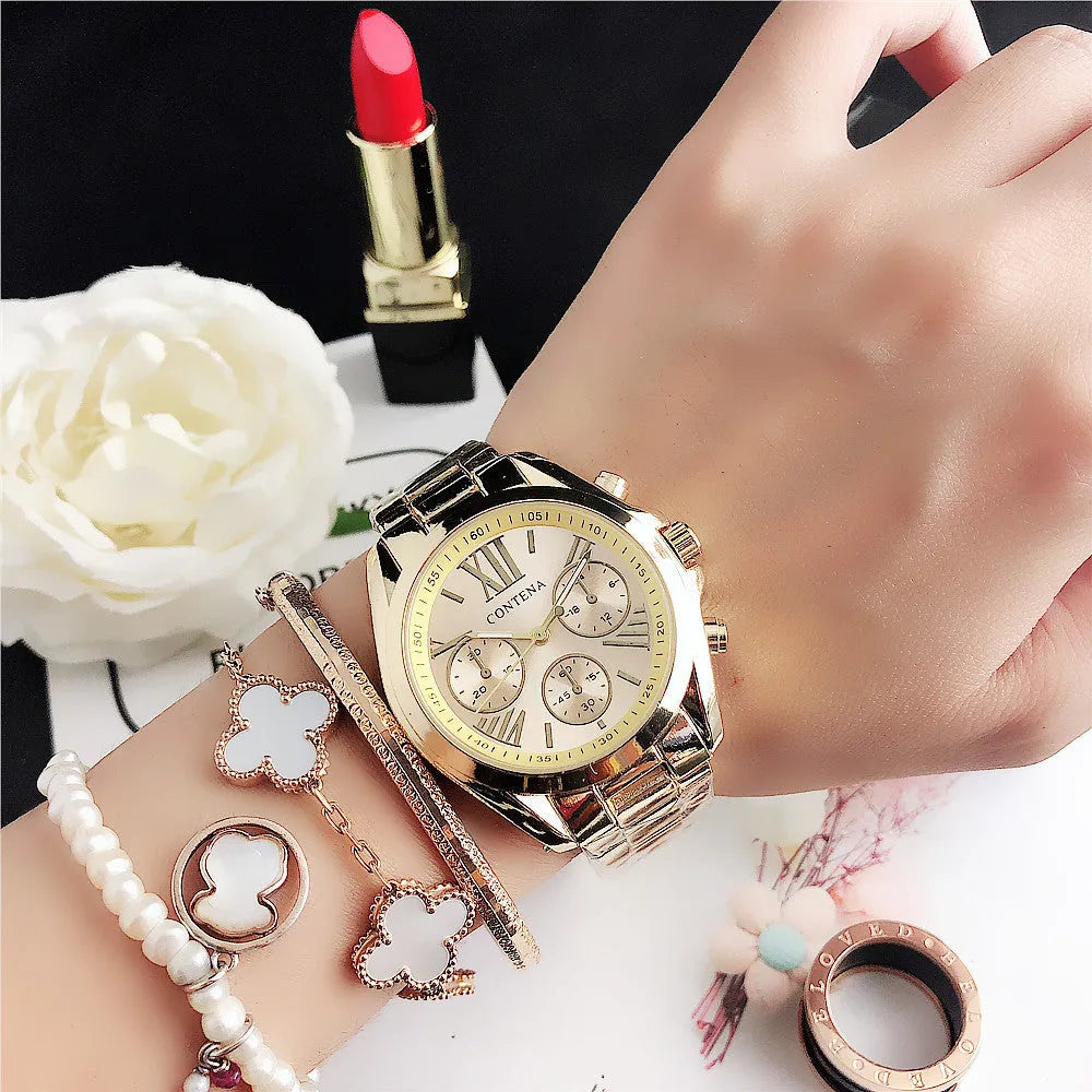 Women's silver and rose gold mesh strap watch with diamond quartz movement and pointer display