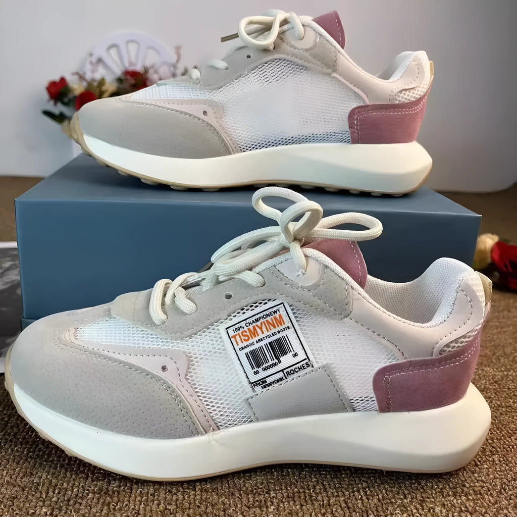 Women's grey and pink low-top retro sneaker with round toe and flat rubber sole