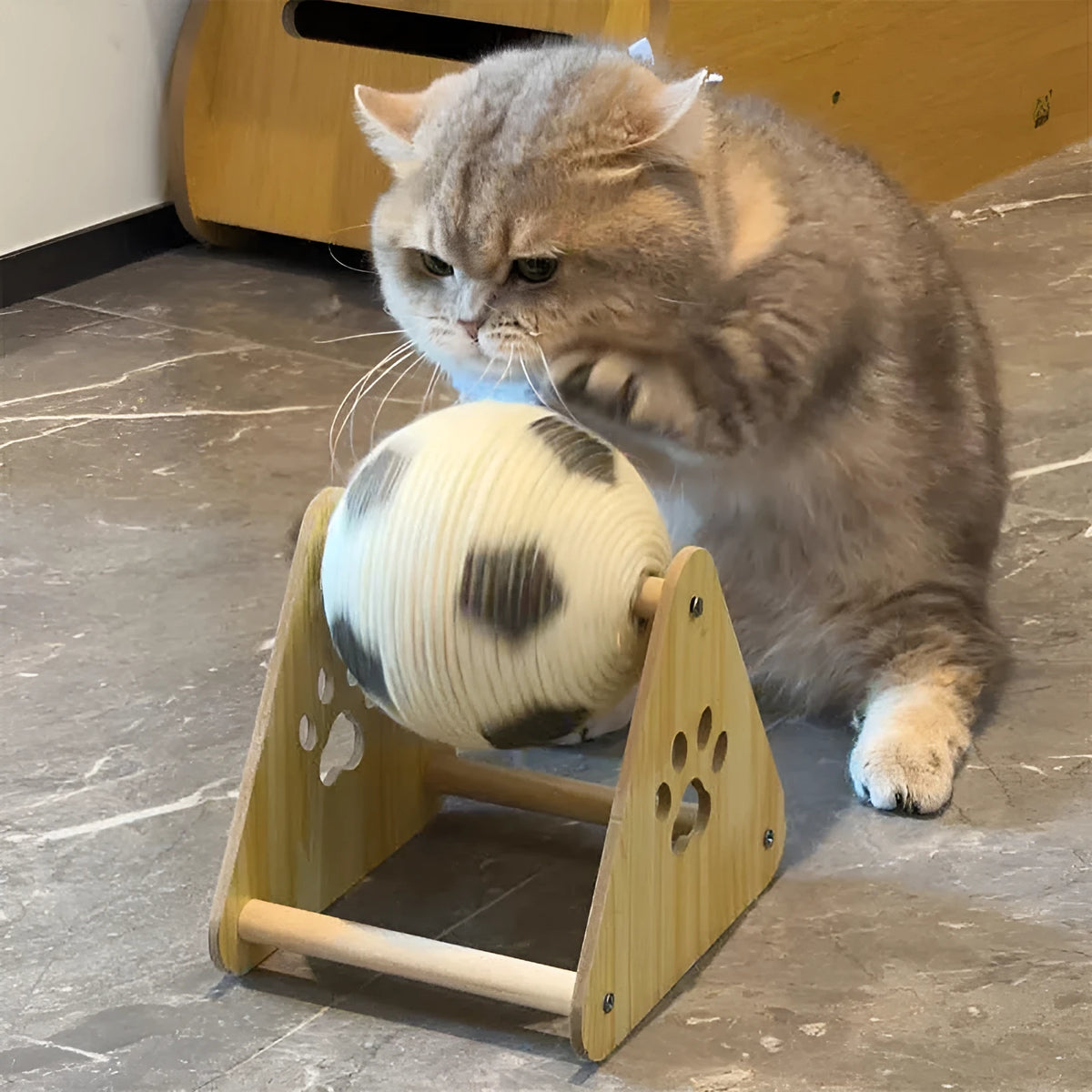 Vertical wooden cat scratching post in football style with solid wood frame and sisal rope surface for claw grinding.