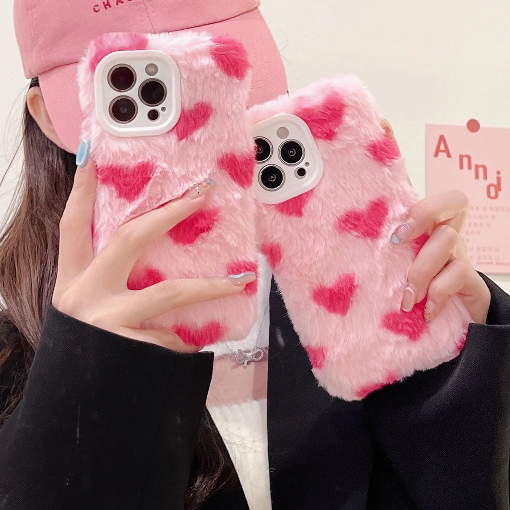 Pink silicone iPhone case with a cartoon design on the back cover.