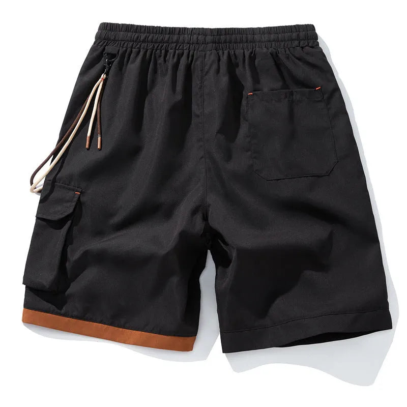 Men's black bamboo fibre sports shorts with a high waist and loose, straight-leg cropped fit on a hanger.