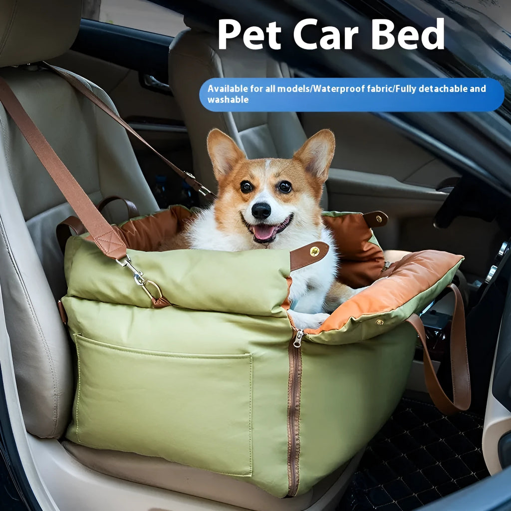 Brown cloth portable cat car kennel with mesh windows, shown on a car seat.