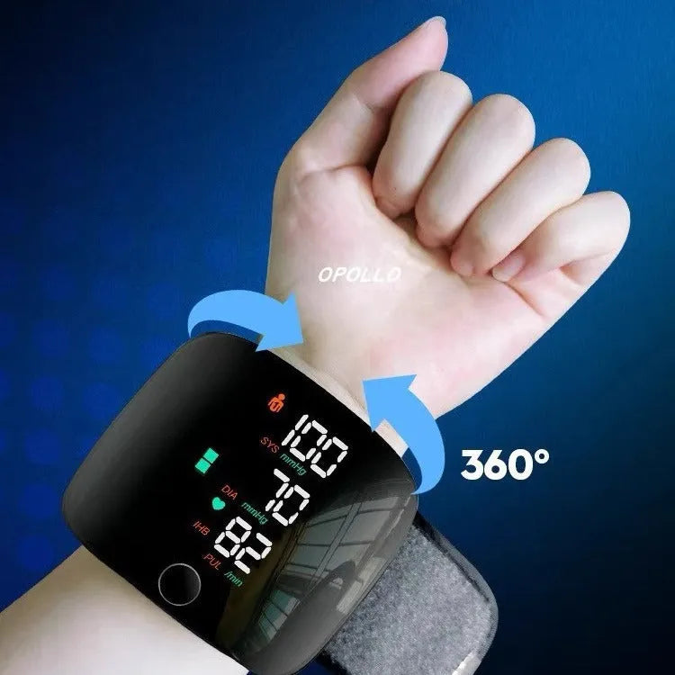 Black wrist blood pressure monitor with USB rechargeable port and multilingual voice guidance options