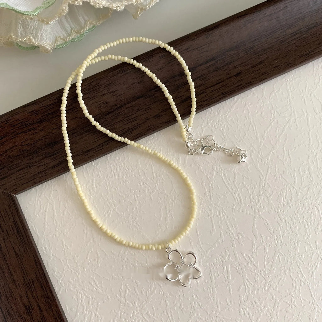 Women's hollow flower necklace with colourful beads on copper chain, Korean style with U-shaped pendant