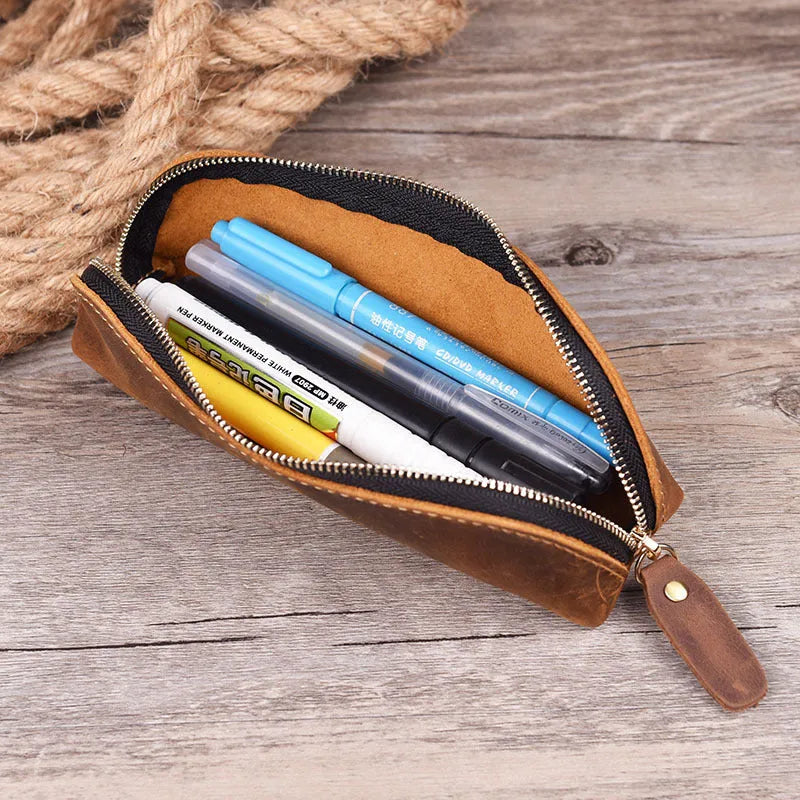 Black genuine leather pencil case with zipper closure measuring 18cm