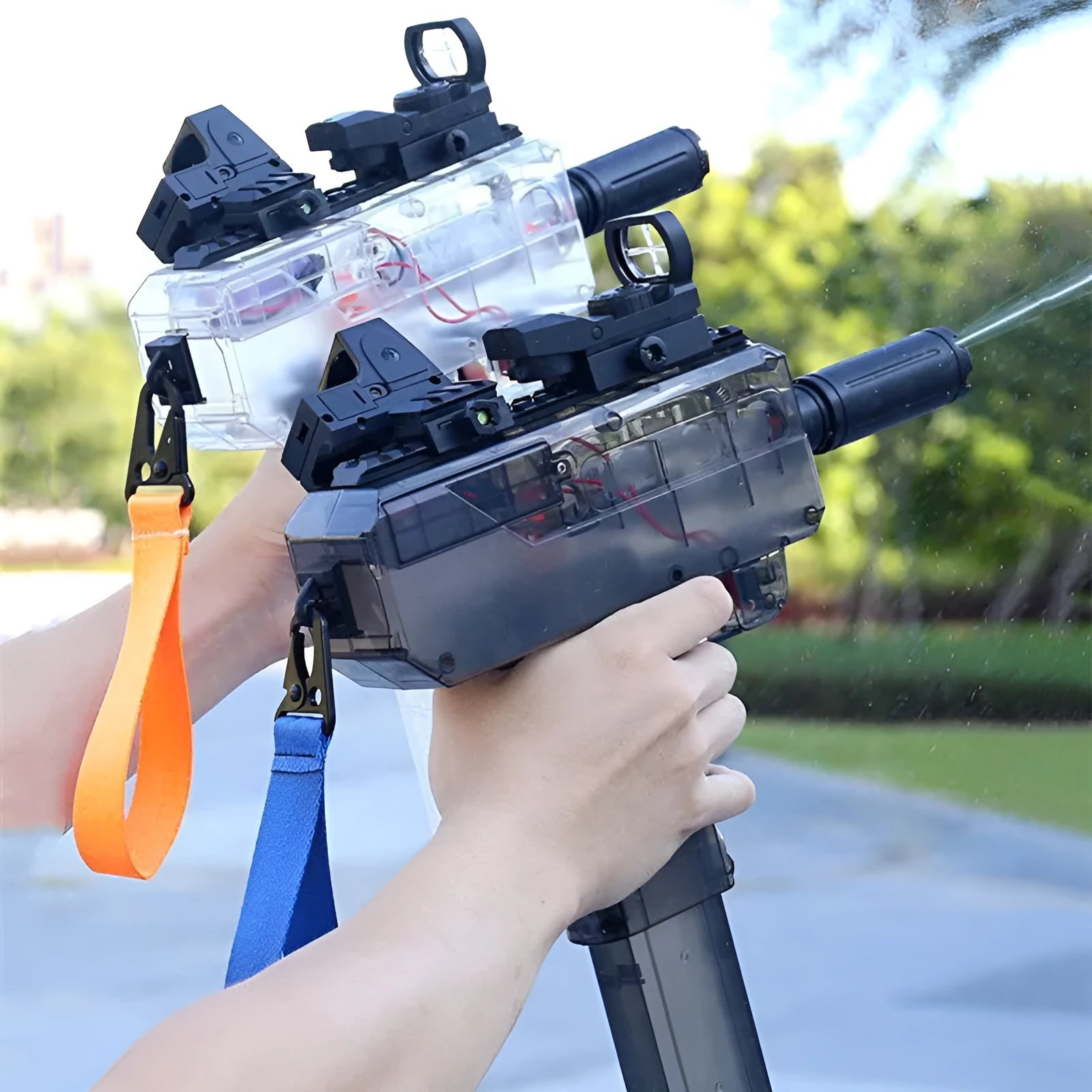 Uzi-style electric water gun toy with transparent blue plastic body and accessories