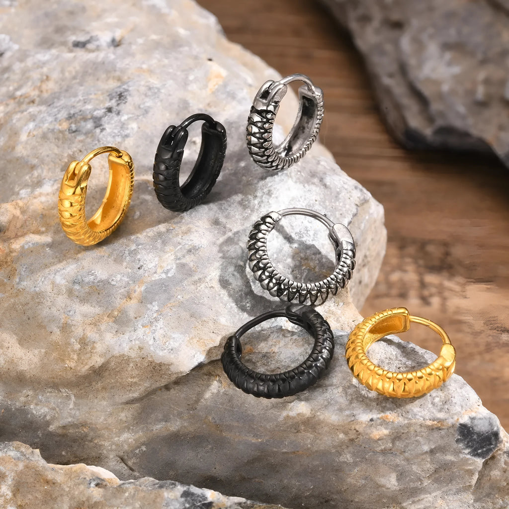 A pair of stainless steel earrings with a snake pattern design in a black finish.