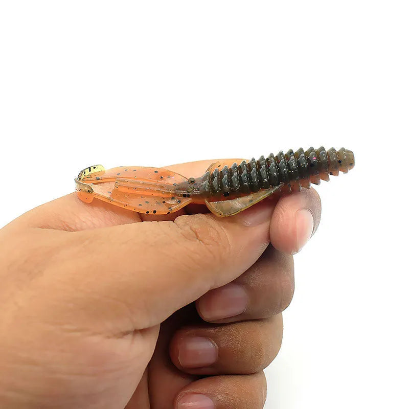 PVC soft bait fishing lure in assorted colours, shown in 8cm and 12cm lengths.
